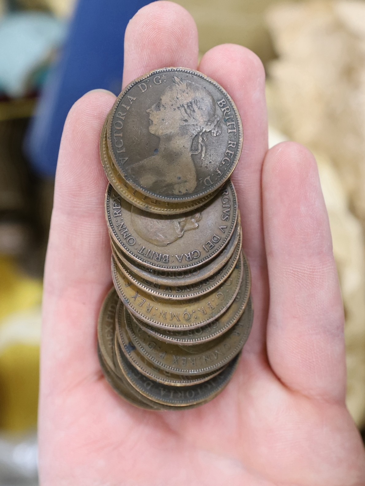 A box of UK and World coins including George V and George VI florins, shillings etc